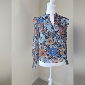 Women's long sleeve floral print blouse. 100% polyester (L).